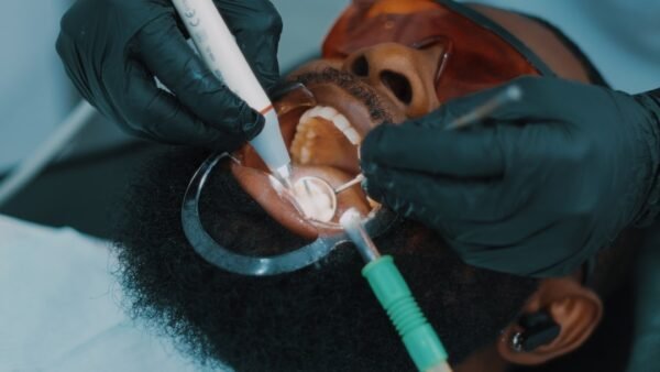 Expanded scope of practice for dental hygienists including anesthesia and restorative procedures under supervision